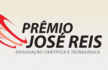 Logo do prêmio José Reis - Divulgação científica e tecnológica, com o nome do prêmio em destaque , escrito em cor preta e um símbolo vermelho que lembra uma espiral